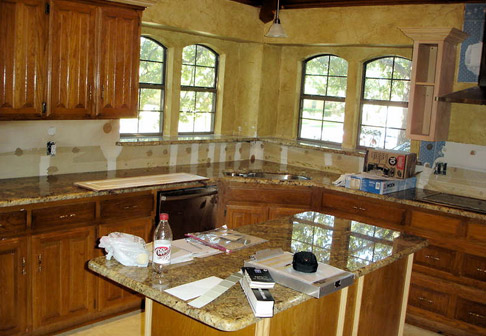 Kitchen with dark cabinets