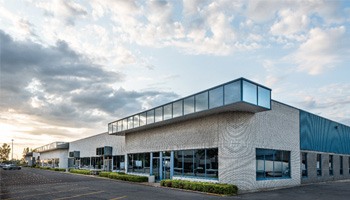 a modern office building during the late afternoon
