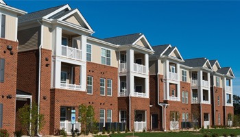 a suburban apartment building during the day