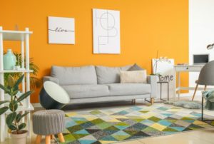 decorated, bold living room with yellow walls