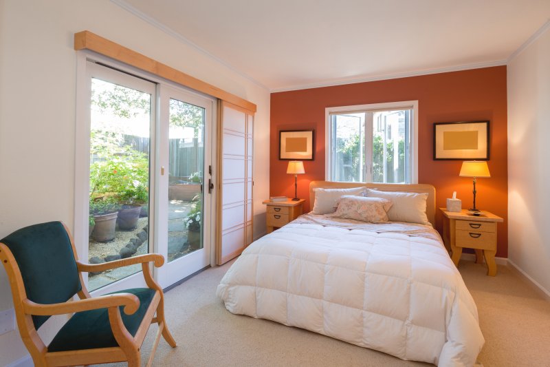 interior room with orange accent wall 