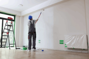 a person painting their home’s interior